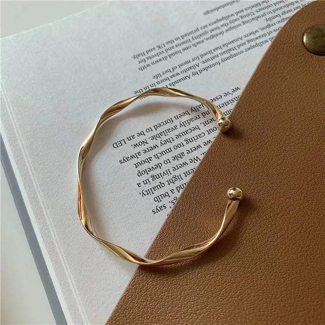 Pulseira Torcida Banhada em Ouro 18k